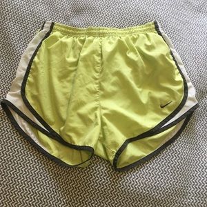 Lime green Nike running shorts